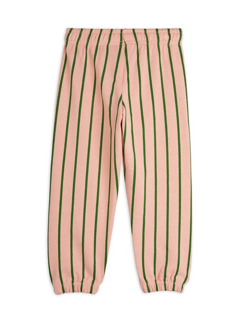 Rückansicht der rosa Mini Rodini Vertical Stripe AOP Sweatpants mit durchgehenden grünen Streifen und elastischem Bund, ideal für Jungen und Mädchen.