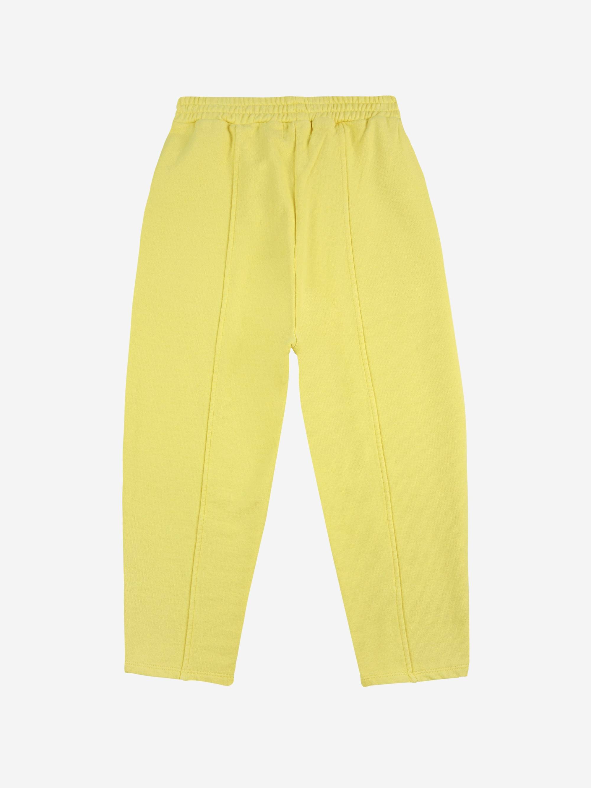 Smiling yellow jogging pants