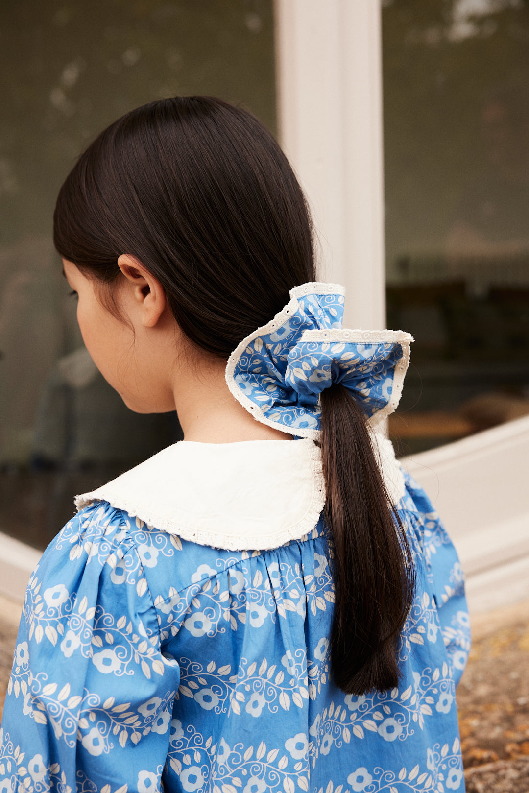 Chouchou Hair Band Farandole Blue - Elasticated Style. Stylish blue hairband with lace trim, securing a ponytail. OEKO-TEX Standard 100, made in India.