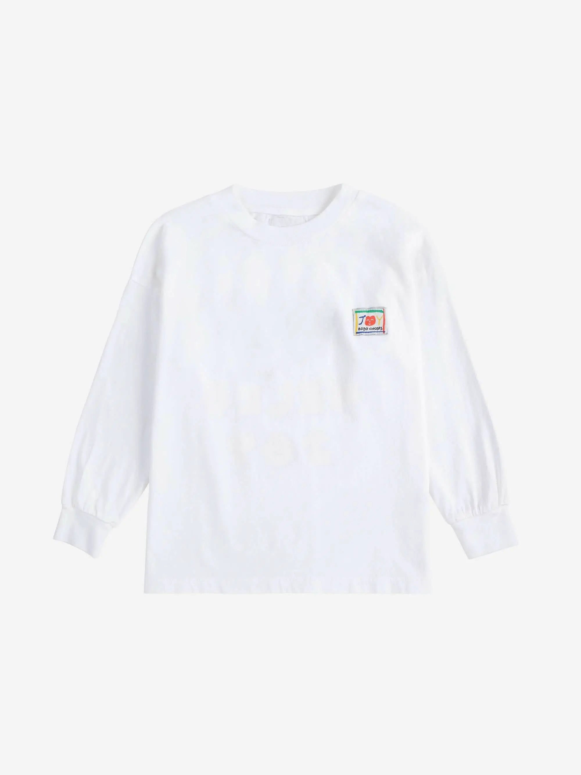 Unisex Hello Joy T-Shirt in Weiß mit langen Ärmeln und elastischen Bündchen, aus weicher Baumwolle. Ideal für Kindergrößen 6-13 Jahre.